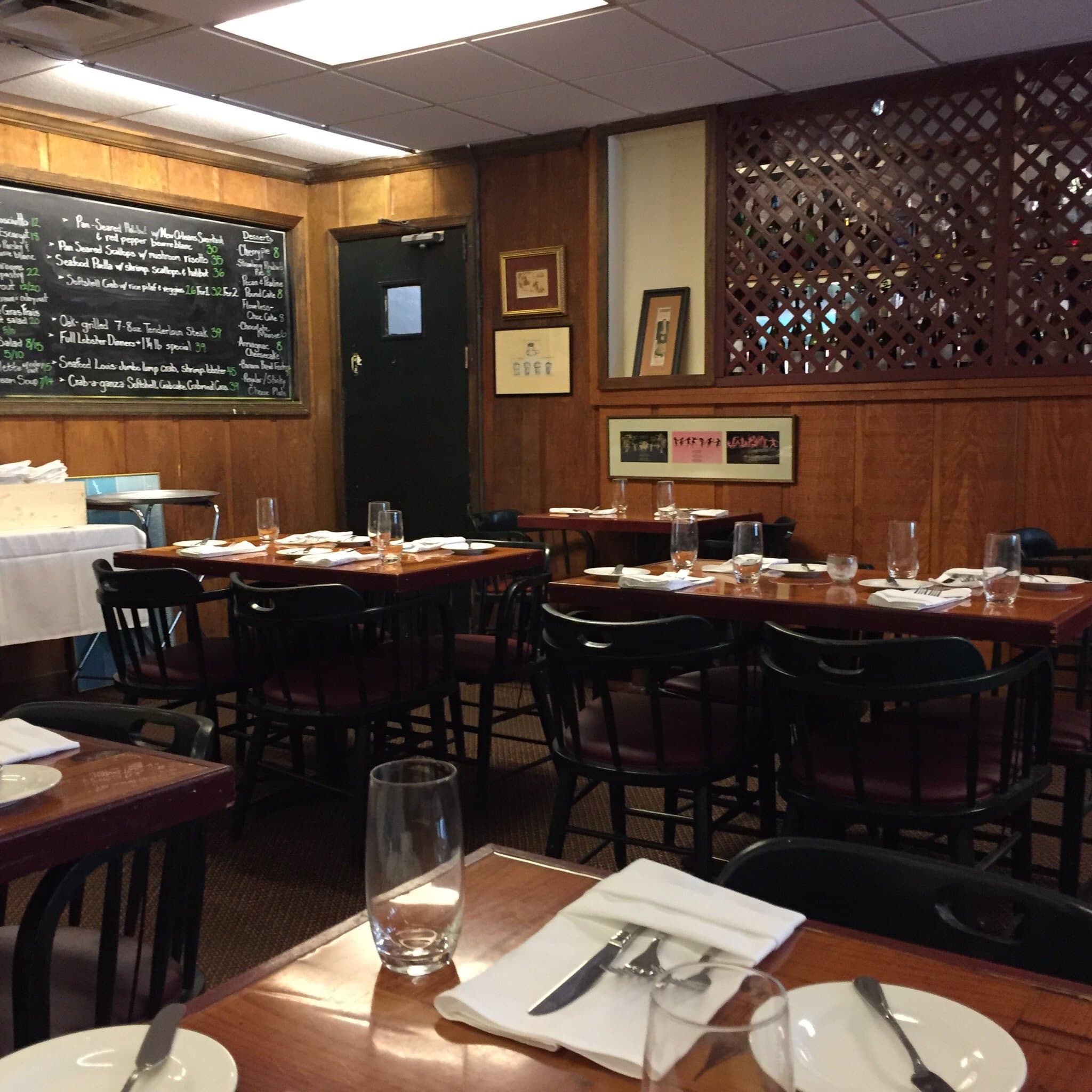 The Tastings dining room with the specials blackboard on the wall